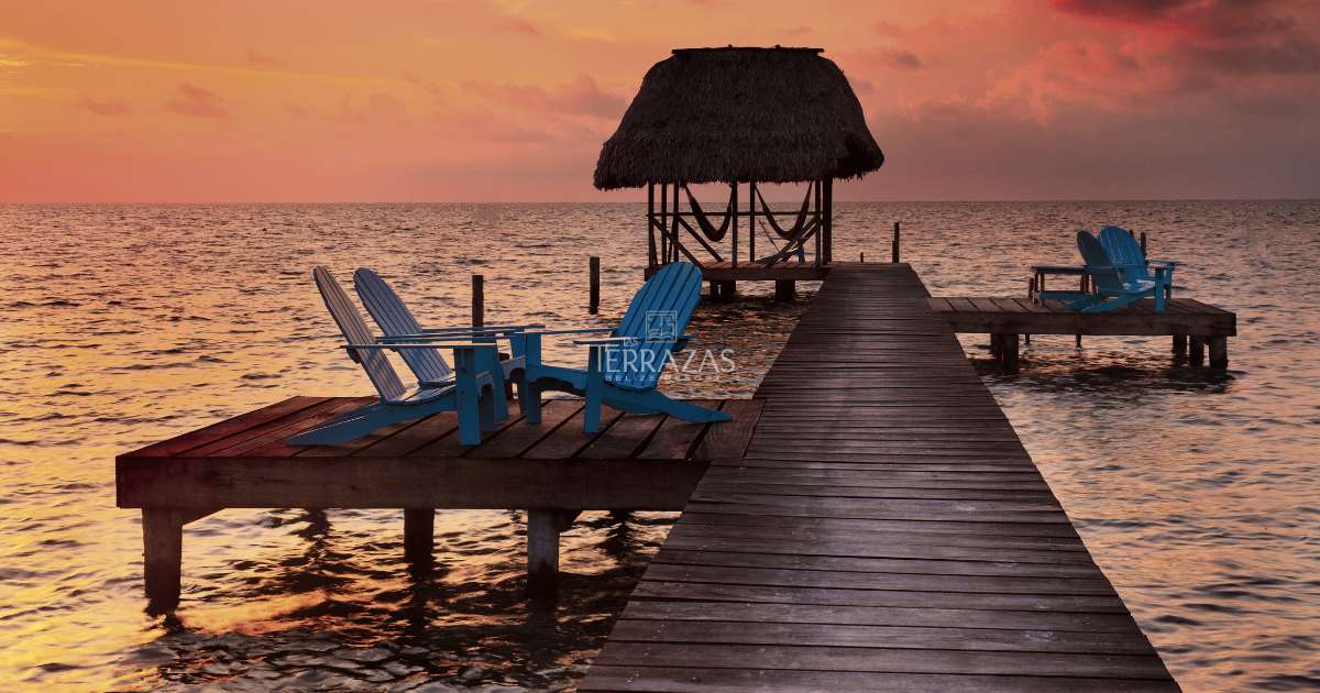 Sunset across a pier in Ambergris Caye