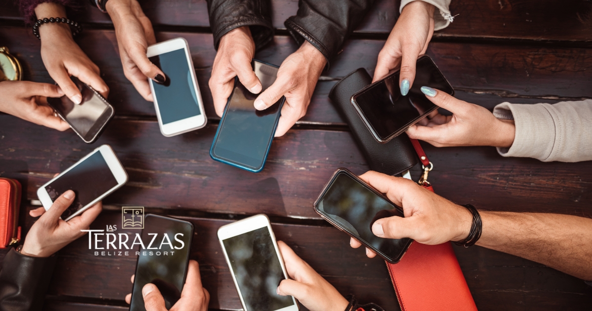 People with their smartphones out.
