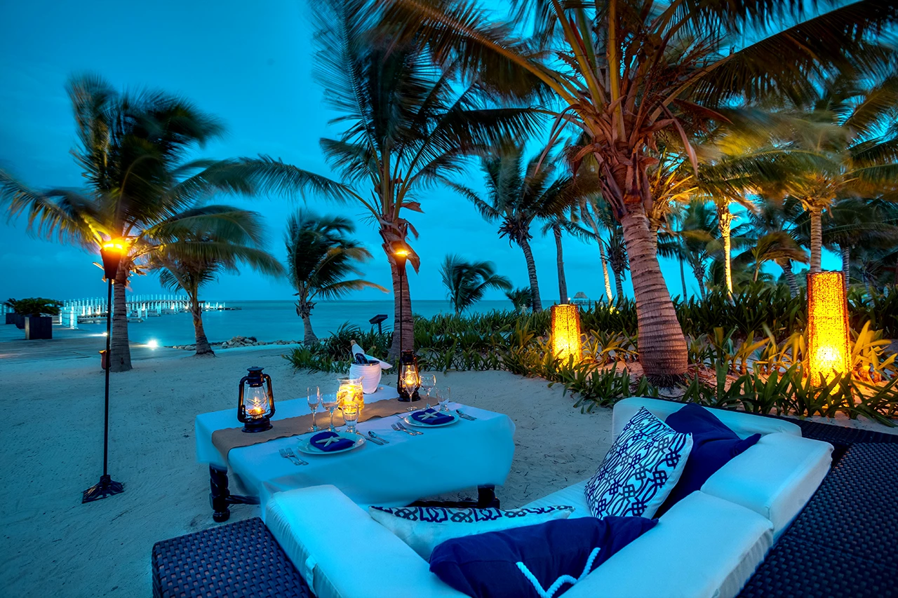 Rooftop Sky Lounge with sunset views, cocktails, and lagoon backdrop