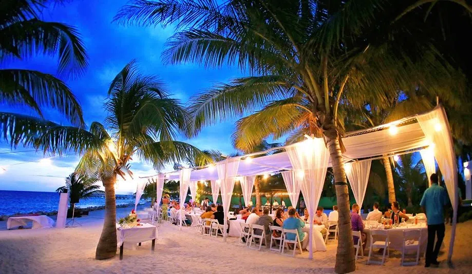 Barefoot Meeting marquee on the beach, chairs and A/V setup