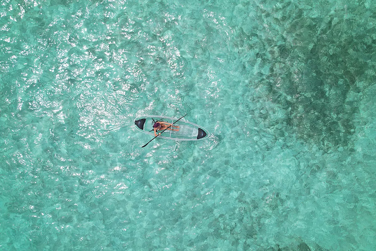 Wooden dock extending into the turquoise Caribbean Sea at Las Terrazas
